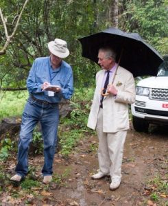 CHALAKUDY, INDIA - NOVEMBER 12: Prince Charles, Prince of Wales (R) and his brother-in-law Mark Shand (founder of the Elephant Family charity) (L) visit the elephant corridor at Vazhachal Forest Range on November 12, 2013 near Chalakudy in the Thrissur district of Kerala, India. The Prince of Wales visited an area of the 2, 200 acre elephant corridor to view first-hand the success of elephant corridors in mitigating wildlife/human conflict and to highlight the work being done to prevent the illegal wildlife trade. (Photo by Arthur Edwards - WPA Pool/Getty Images)